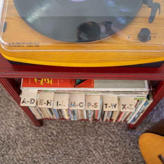 Vinyl Record Dividers - Laser Cut Wood - A-D, E-H, I-L, M-O, P-S, T-W, X-Z cut out letters separating stack of vinyl records under record player by LeeMo Designs in Bend, Oregon