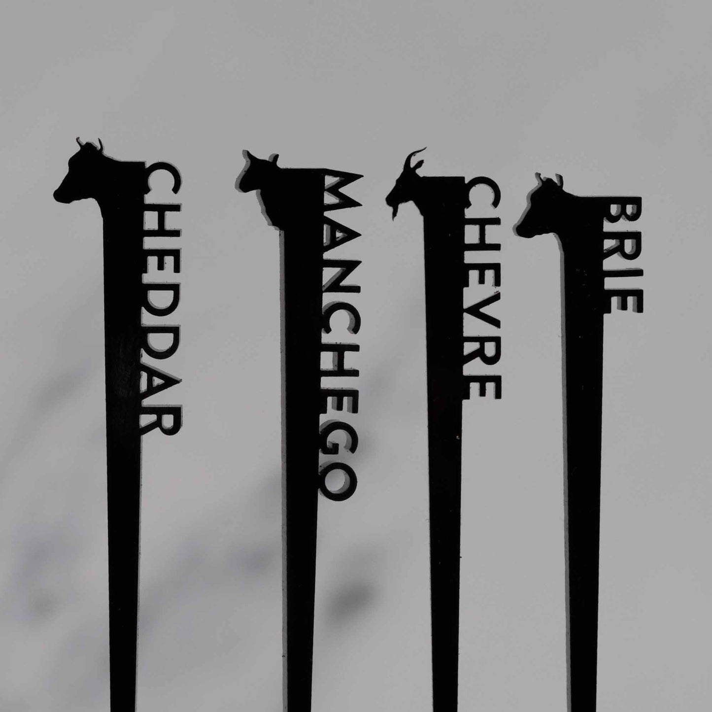 Cheese labels - laser cut black acrylic with cheese name and animal head - by LeeMo Designs in Bend, Oregon