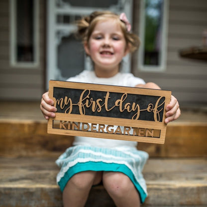 Reversible first day last day of school wood sign in script style with interchangeable grade inserts, reusable from preschool through high school for milestone photos.